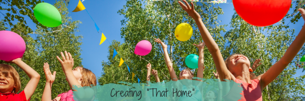 Kids playing with balloons with the blog title creating that home